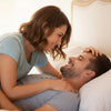 A happy couple sharing a close moment at home to improve their intimacy and connection.